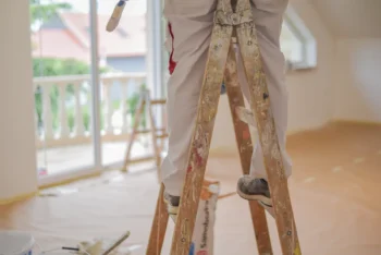 Painter handyman standing on